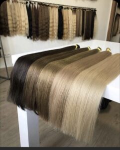 High-quality human hair extensions displayed at Bharat Hair India facility